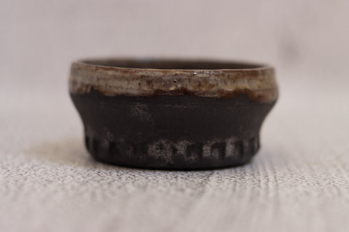 132. Black clay dip bowl