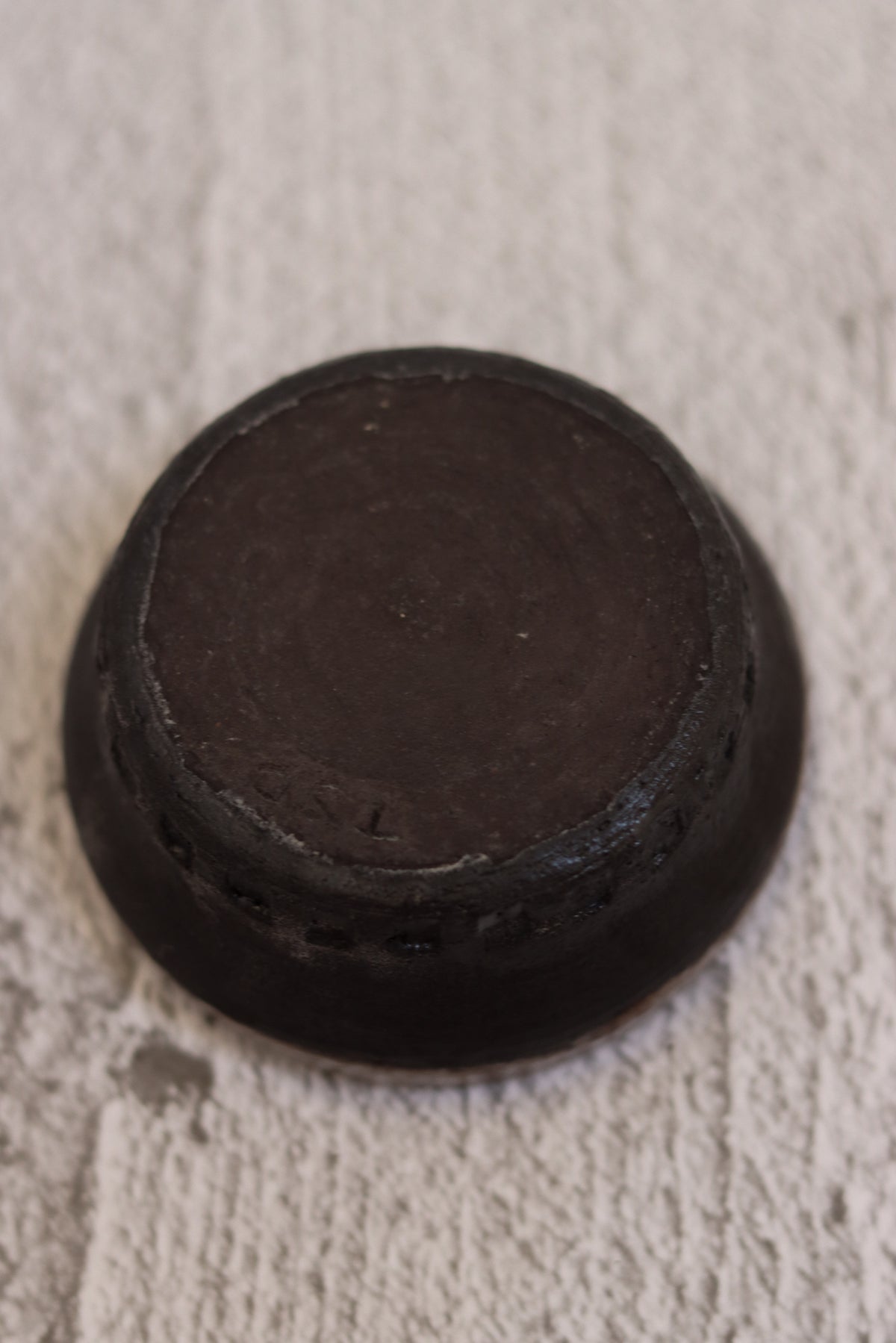 132. Black clay dip bowl