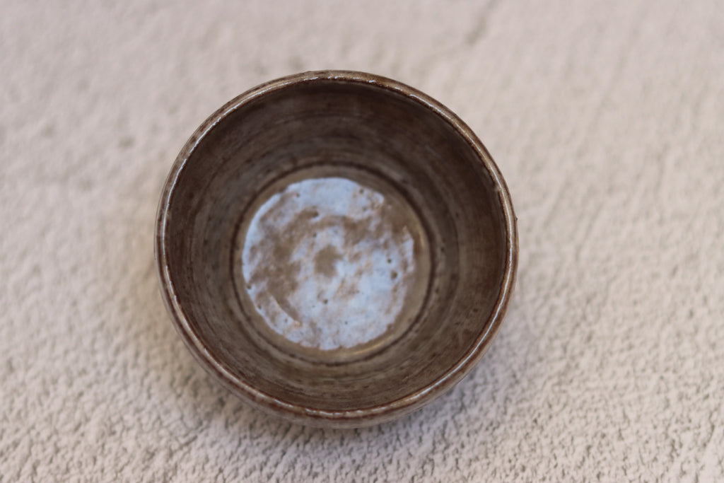 132. Black clay dip bowl