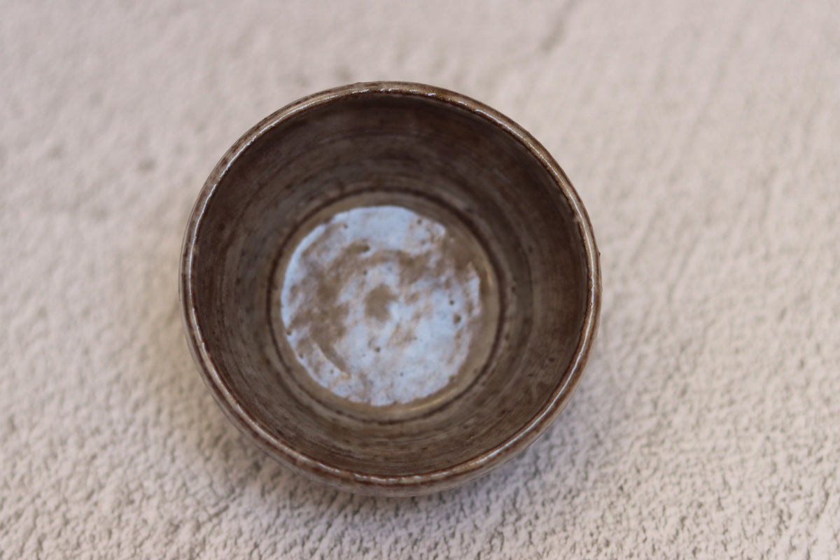 132. Black clay dip bowl