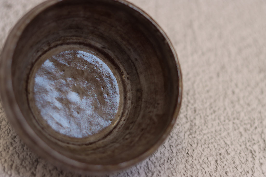 132. Black clay dip bowl