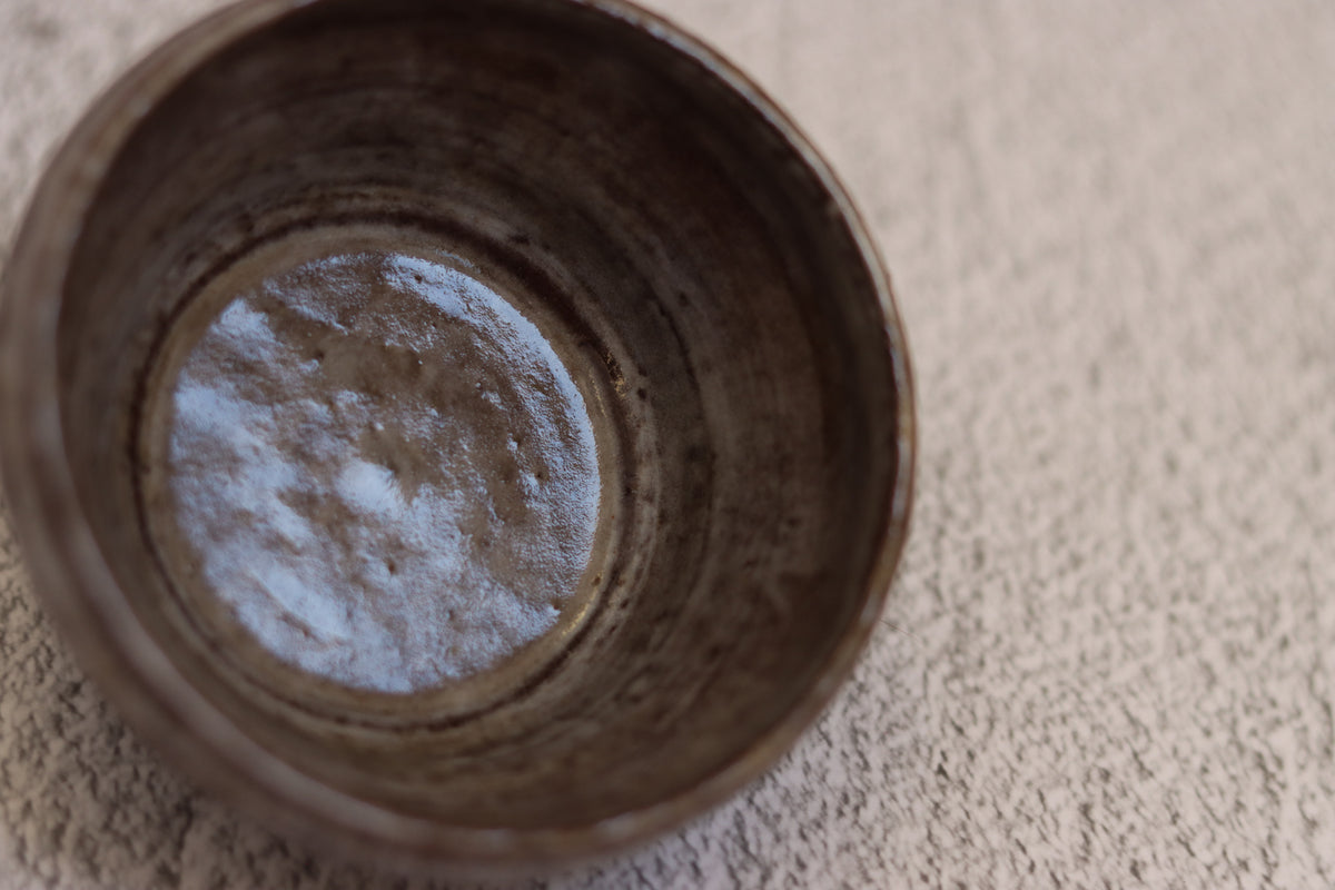 132. Black clay dip bowl