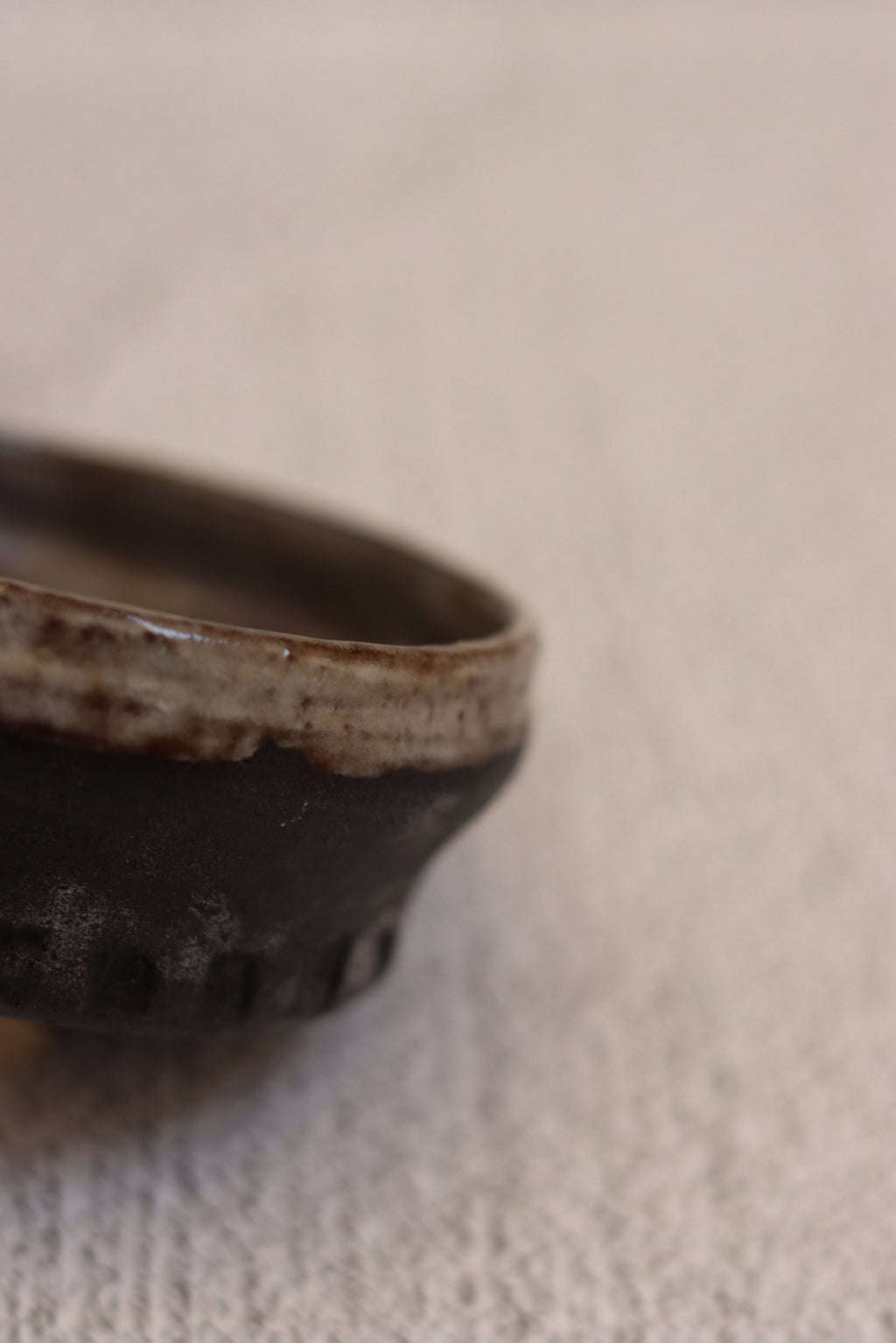 132. Black clay dip bowl