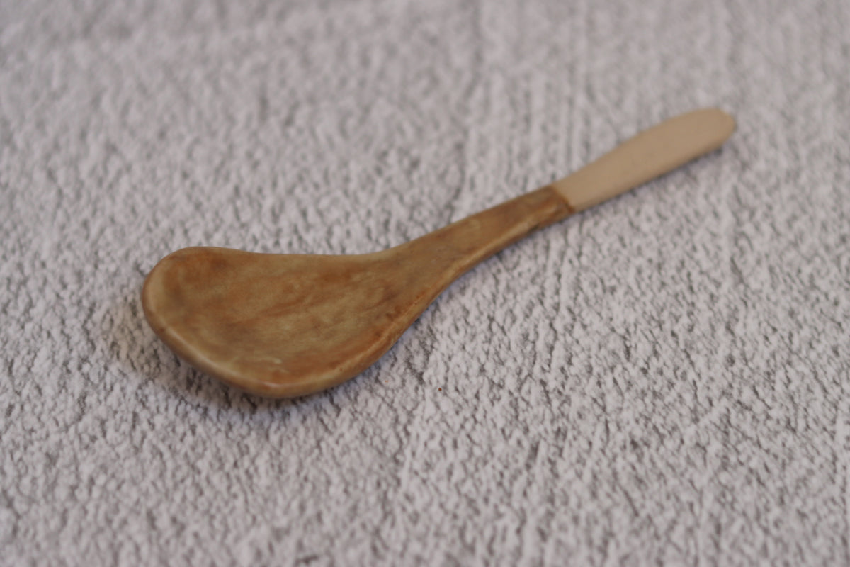 122. Offset Spoon Tan